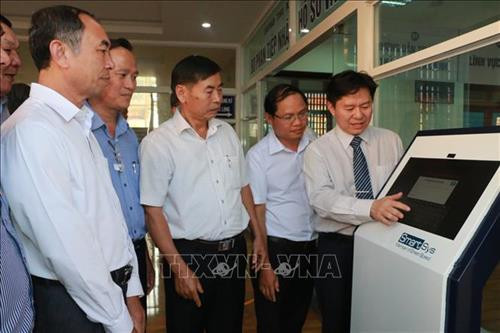 Hệ thống đo lường sự hài lòng của người dân đặt tại bộ phận tiếp nhận hồ sơ và trả kết quả. Ảnh: K GỬIH - TTXVN