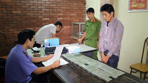 Đối tượng Khà A Lứ, tại cơ quan công an. Ảnh Lê Hữu Quyết- TTXVN Đối tượng Khà A Lứ, tại cơ quan công an. Ảnh Lê Hữu Quyết- TTXVN