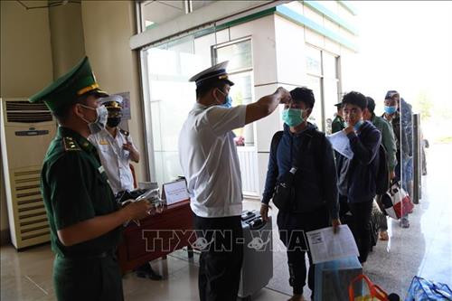 Công tác chủ đồng phòng dịch bệnh Covid-19 tại cửa khẩu quốc tế Hoa Lư tỉnh Bình Phước. Ảnh: Dương Chí Tưởng-TTXVN