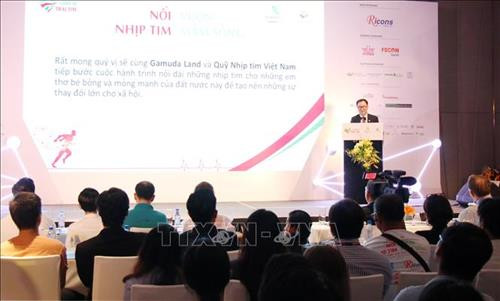 Ban Tổ chức giới thiệu Chương trình “Chạy vì trái tim” năm 2019. Ảnh: Tiến Lực - TTXVN