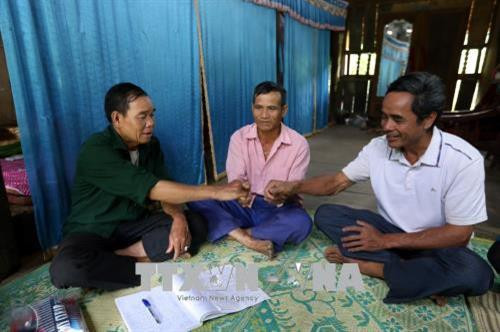 Tổ hòa giải số 1 thị trấn Điện Biên Đông đã hòa giải thành công 40 vụ việc về tranh chấp đất đai, hôn nhân... Ảnh: Phan Tuấn Anh - TTXVN