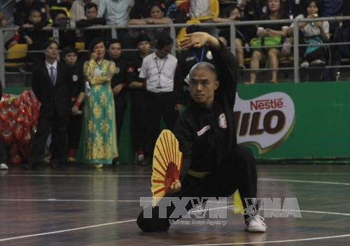 Võ sinh với nội dung quyền binh khí. Ảnh: Xuân Dự - TTXVN