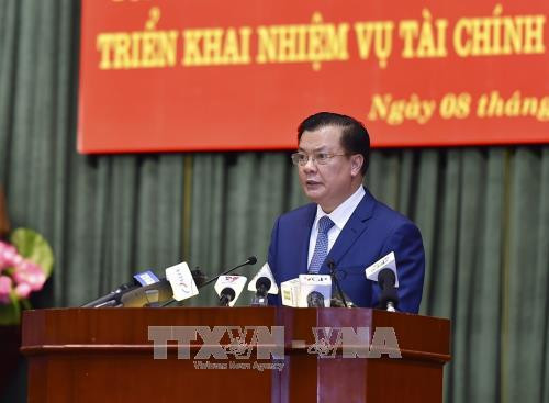 Bộ trưởng Bộ Tài chính Đinh Tiến Dũng phát biểu. Ảnh: Phạm Hậu - TTXVN Bộ trưởng Bộ Tài chính Đinh Tiến Dũng phát biểu. Ảnh: Phạm Hậu - TTXVN