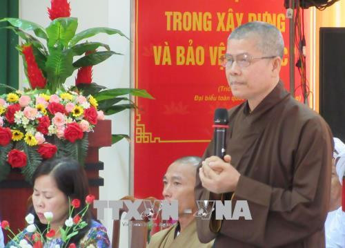 Đại biểu phát biểu ý kiến đóng góp tại buổi gặp mặt. Ảnh: Nguyễn Thành – TTXVN