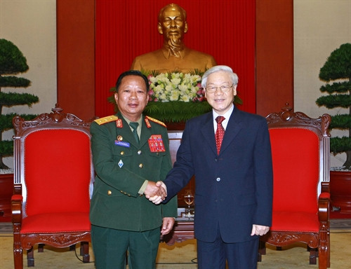 Tổng Bí thư Nguyễn Phú Trọng tiếp Bộ trưởng Bộ Quốc phòng CHDCND Lào Chansamon Channhalat đang trong chuyến thăm chính thức Việt Nam. Ảnh: Doãn Tấn – TTXVN Tổng Bí thư Nguyễn Phú Trọng tiếp Bộ trưởng Bộ Quốc phòng CHDCND Lào Chansamon Channhalat đang trong chuyến thăm chính thức Việt Nam. Ảnh: Doãn Tấn – TTXVN