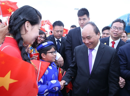 Lễ đón Thủ tướng Chính phủ Nguyễn Xuân Phúc tại sân bay quốc tế Wuxu Nam Ninh, tỉnh Quảng Tây (Trung Quốc). Ảnh: Thống Nhất-TTXVN