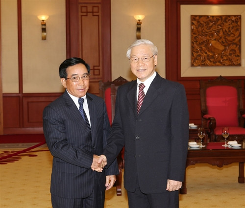 Tổng Bí thư Nguyễn Phú Trọng tiếp đồng chí Phankham Viphavanh, Uỷ viên Bộ Chính trị, Thường trực Ban Bí thư Trung ương Đảng Nhân dân Cách mạng Lào, Phó Chủ tịch nước Cộng hoà Dân chủ Nhân dân Lào đang thăm chính thức Việt Nam. Ảnh: Trí Dũng –TTXVN