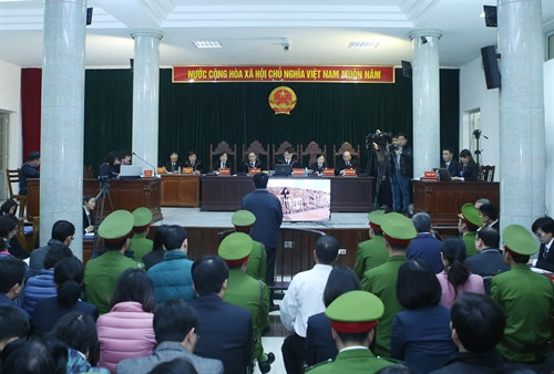 Quang cảnh phiên xét xử. Ảnh: Phạm Kiên – TTXVN Quang cảnh phiên xét xử. Ảnh: Phạm Kiên – TTXVN