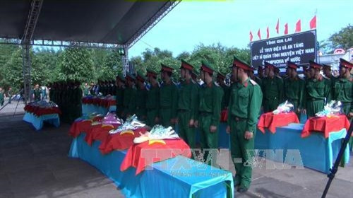 Lễ truy điệu và an táng hài cốt 29 liệt sỹ. Ảnh: Hoài Nam - TTXVN