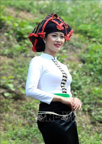 Vẻ đẹp của phụ nữ Thái khi mặc trang phục truyền thống của dân tộc. Ảnh: Phan Tuấn Anh - TTXVN Vẻ đẹp của phụ nữ Thái khi mặc trang phục truyền thống của dân tộc. Ảnh: Phan Tuấn Anh - TTXVN