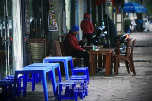 Người lao động Hà Nội trong đợt giá rét kỷ lục của mùa đông ảnh 4