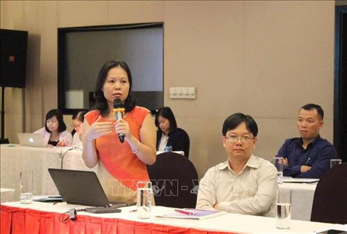 Đại biểu trao đổi tại hội thảo. Ảnh: Xuân Anh - TTXVN Đại biểu trao đổi tại hội thảo. Ảnh: Xuân Anh - TTXVN