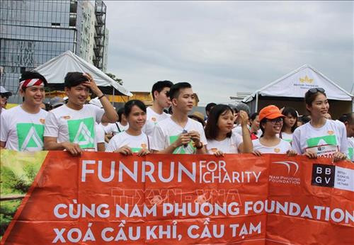 Chương trình chạy bộ Fun run với những mục đích tốt đẹp. Ảnh: Xuân Dự - TTXVN