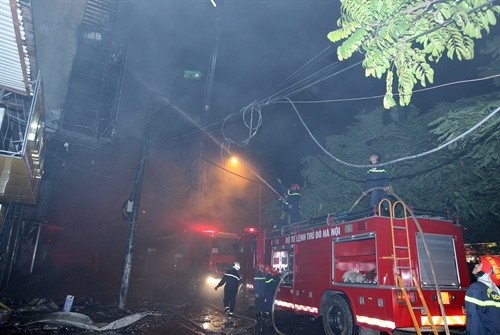 Hiện trường vụ hỏa hoạn. Ảnh: Quốc Khánh- TTXVN Hiện trường vụ hỏa hoạn. Ảnh: Quốc Khánh- TTXVN
