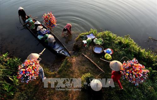 Tác phẩm "Khúc sông quê" tại triển lãm. Ảnh: BTC cung cấp/TTXVN phát