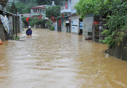 Mưa to gây ngập úng cục bộ nhiều nơi ở Lai Châu Ảnh: Quang Duy- TTXVN Mưa to gây ngập úng cục bộ nhiều nơi ở Lai Châu Ảnh: Quang Duy- TTXVN