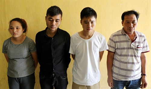 Các đối tượng tại cơ quan điều tra. Ảnh: Văn Đạt - TTXVN Các đối tượng tại cơ quan điều tra. Ảnh: Văn Đạt - TTXVN