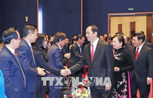 Chủ tịch nước Trần Đại Quang với các đại biểu. Ảnh: Nhan Sáng-TTXVN Chủ tịch nước Trần Đại Quang với các đại biểu. Ảnh: Nhan Sáng-TTXVN