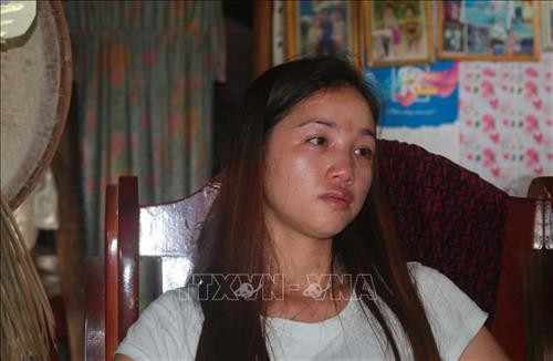 Chị Nông Thị Đ (sinh năm 1990) không nguôi nỗi đau khi chồng bị chết ở nơi xứ người. Ảnh: Chu Hiệu - TTXVN Chị Nông Thị Đ (sinh năm 1990) không nguôi nỗi đau khi chồng bị chết ở nơi xứ người. Ảnh: Chu Hiệu - TTXVN