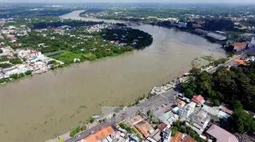 Một đoạn sông Sài Gòn chảy qua địa bàn Thành phố Thủ Dầu Một. Ảnh: Mạnh Linh-TTXVN Một đoạn sông Sài Gòn chảy qua địa bàn Thành phố Thủ Dầu Một. Ảnh: Mạnh Linh-TTXVN