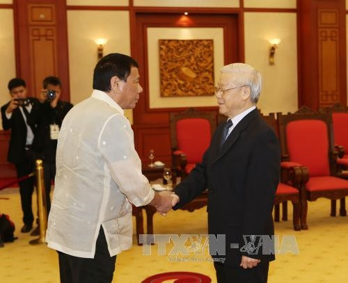 Tổng Bí thư Nguyễn Phú Trọng tiếp Tổng thống Cộng hòa Philippines Rodrigo Duterte thăm chính thức Việt Nam. Ảnh: Trí Dũng/TTXVN