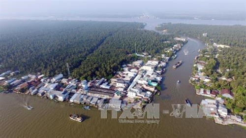 Một góc cù lao Tắc Cậu nằm giữa 2 dòng sông Cái Bé và Cái Lớn. Ở giữa cù lao Tắc Cậu có con rạch Lòng Tắc, chia vùng đất cù lao thành 2 phần, một nửa thuộc xã Bình An và phần còn lại thuộc xã Vĩnh Hòa Phú (huyện Châu Thành). Ảnh: Mạnh Linh-TTXVN