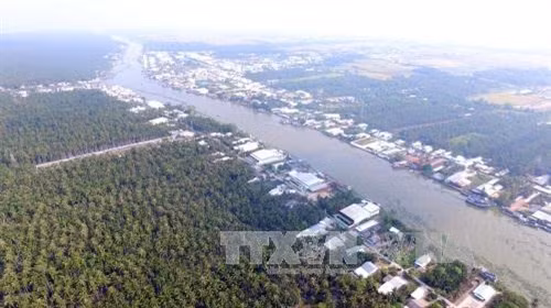 Một góc cù lao Tắc Cậu bên dòng sông Cái Bé, xã Bình An, huyện Châu Thành, Kiên Giang. Ảnh: Mạnh Linh-TTXVN