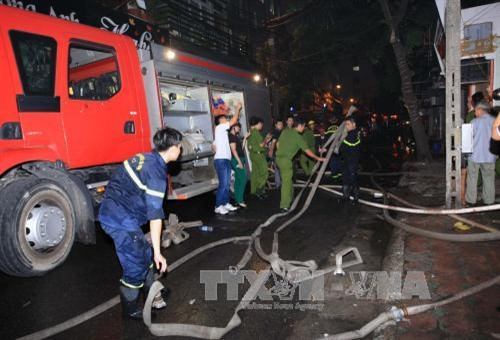 Dập tắt vụ cháy ở Khu tập thể Trần Quốc Toản ảnh 1