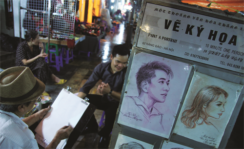 Vẽ ký họa tại chợ đêm