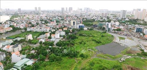 Nhiều dự án được giao đất trong khu tái định cư 160ha. Ảnh: Quang Nhựt - TTXVN Nhiều dự án được giao đất trong khu tái định cư 160ha. Ảnh: Quang Nhựt - TTXVN