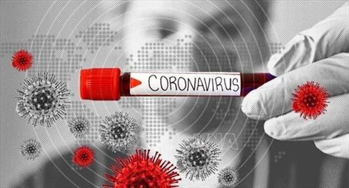 Bảng cảnh báo về virus corona. Ảnh: IRNA/TTXVN