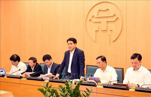 Chủ tịch UBND thành phố, Trưởng ban Chỉ đạo phòng, chống dịch bệnh COVID - 19 Hà Nội Nguyễn Đức Chung phát biểu tại cuộc họp.Ảnh: Kiên Phạm - TTXVN