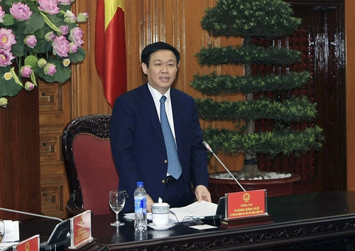 Phó Thủ tướng Vương Đình Huệ phát biểu tại buổi gặp mặt. Ảnh: Phạm Kiên – TTXVN