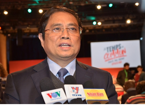 Ủy viên Bộ Chính trị, Bí thư Trung ương Đảng, Trưởng Ban Tổ chức Trung ương Phạm Minh Chính trả lời phỏng vấn báo chí. Ảnh: TTXVN