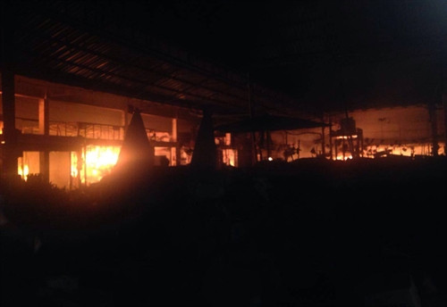 Hiện trường vụ hỏa hoạn. Ảnh: Nguyễn Chiến- TTXVN Hiện trường vụ hỏa hoạn. Ảnh: Nguyễn Chiến- TTXVN