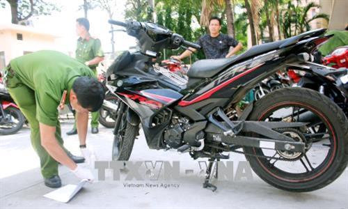 Công an thu giữ phương tiện gây án của đối tượng là chiếc xe Exciter . Ảnh: Hoàng Hải-TTXVN