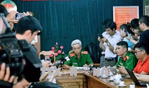 Thiếu tướng Phan Anh Minh, Phó giám đốc Công an Thành phố Hồ Chí Minh phát biểu thông báo với báo chí. Ảnh: Hoàng Hải-TTXVN