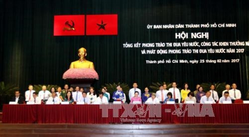 Lễ ký kết Giao ước thi đua giữa các cụm, khối của thành phố năm 2017. Ảnh: Thanh Vũ-TTXVN