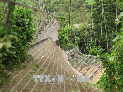 Cầu treo Hải Sơn ở bản Hải Sơn, xã Chiềng Khoong (Sông Mã, Sơn La) bị sự cố tụt dây cáp. Ảnh: Lê Hữu Quyết - TTXVN Cầu treo Hải Sơn ở bản Hải Sơn, xã Chiềng Khoong (Sông Mã, Sơn La) bị sự cố tụt dây cáp. Ảnh: Lê Hữu Quyết - TTXVN