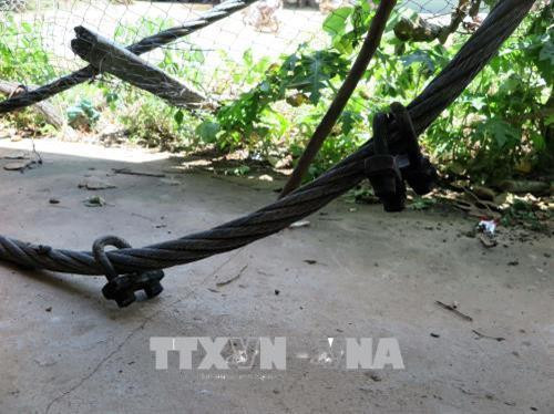 Hệ thống cóc cáp vẫn còn nguyên vẹn sau sự cố. Ảnh: Lê Hữu Quyết - TTXVN Hệ thống cóc cáp vẫn còn nguyên vẹn sau sự cố. Ảnh: Lê Hữu Quyết - TTXVN