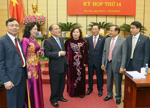 Chủ tịch Quốc hội Nguyễn Sinh Hùng với các đại biểu tại phiên khai mạc kỳ họp lần thứ 14, Hội đồng nhân dân Thành phố Hà Nội khóa XIV, nhiệm kỳ 2011-2016. Ảnh: Nhan Sáng-TTXVN