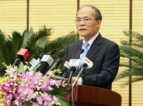 Chủ tịch Quốc hội Nguyễn Sinh Hùng phát biểu tại phiên khai mạc kỳ họp lần thứ 14, Hội đồng nhân dân Thành phố Hà Nội khóa XIV, nhiệm kỳ 2011-2016. Ảnh: Nhan Sáng-TTXVN