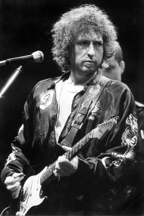 Trong ảnh (tư liệu): Nghệ sĩ Bob Dylan biểu diễn tại Munich, miền nam Đức ngày 29/7/1981. AFP/TTXVN Trong ảnh (tư liệu): Nghệ sĩ Bob Dylan biểu diễn tại Munich, miền nam Đức ngày 29/7/1981. AFP/TTXVN