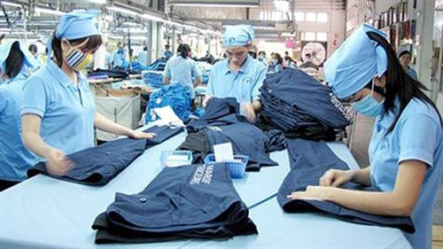 Lao động nữ ngành dệt may - Theo http://www.sggp.org.vn