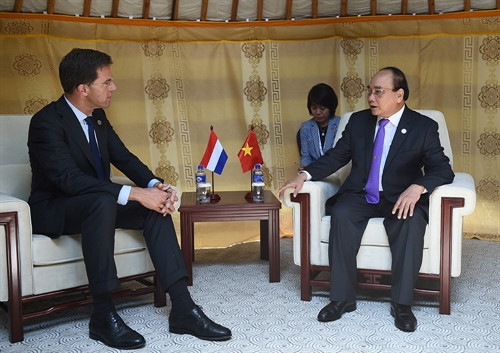 Bên lề Hội nghị Cấp cao Á - Âu lần thứ 11, sáng 15/7/2016, tại thủ đô Ulaan Baator, Mông Cổ, Thủ tướng Chính phủ Nguyễn Xuân Phúc gặp gỡ Thủ tướng Hà Lan, Mark Rutte. Ảnh: Thống Nhất-TTXVN