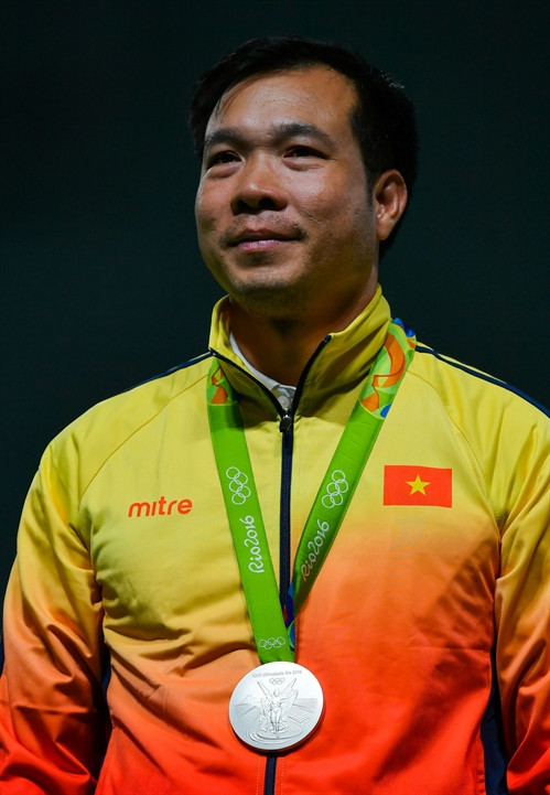 Xạ thủ Hoàng Xuân Vinh mang về tấm Huy chương thứ hai cho thể thao Việt Nam tại Olympic Rio ngày 10/8. AFP/ TTXVN Xạ thủ Hoàng Xuân Vinh mang về tấm Huy chương thứ hai cho thể thao Việt Nam tại Olympic Rio ngày 10/8. AFP/ TTXVN