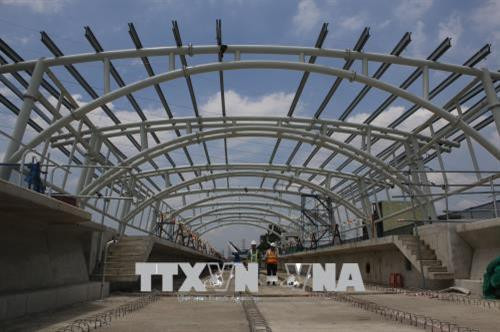 Hệ thống mái vòm nhà ga Khu công nghệ cao(Thành phố Hồ Chí Minh). Ảnh: Hoàng Hải-TTXVN Hệ thống mái vòm nhà ga Khu công nghệ cao(Thành phố Hồ Chí Minh). Ảnh: Hoàng Hải-TTXVN