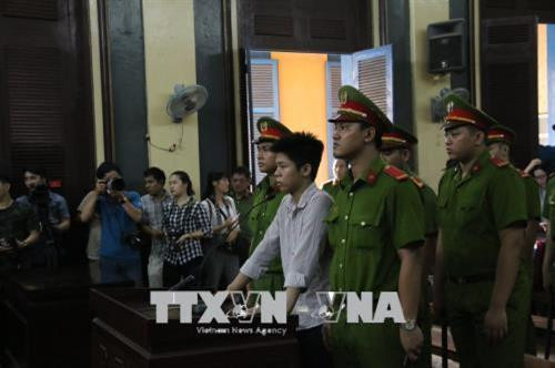 Bị cáo Nguyễn Hữu Tình tại phiên tòa. Ảnh: Thành Chung - TTXVN