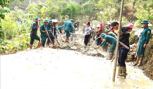 Đường giao thông nông thôn góp phần phát triển kinh tế - xã hội ở địa phương. Ảnh: Nguyễn Cường - TTXVN Đường giao thông nông thôn góp phần phát triển kinh tế - xã hội ở địa phương. Ảnh: Nguyễn Cường - TTXVN