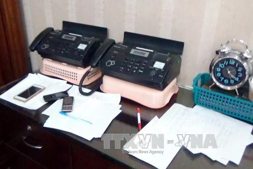 Tang vật được lực lượng chức năng thu giữ từ các điểm thầu đề. Ảnh: Tuấn Anh-TTXVN Phát